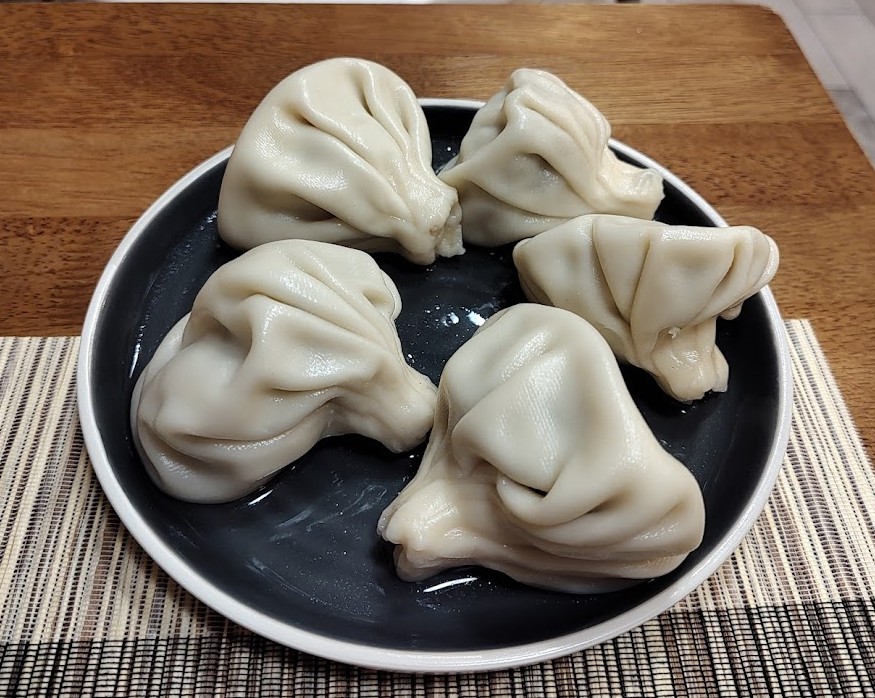 Plato de khinkali del restaurante georgiano Nanina en Praga